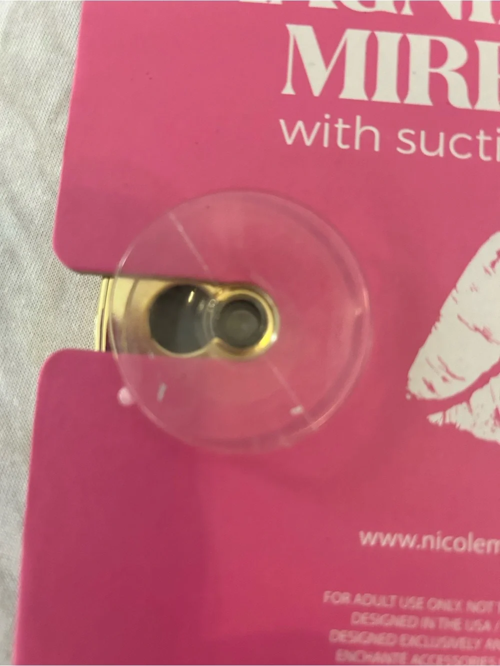 Nicole Miller Gold-Trim Magnifying Mirror with Hot Pink Lip Motif